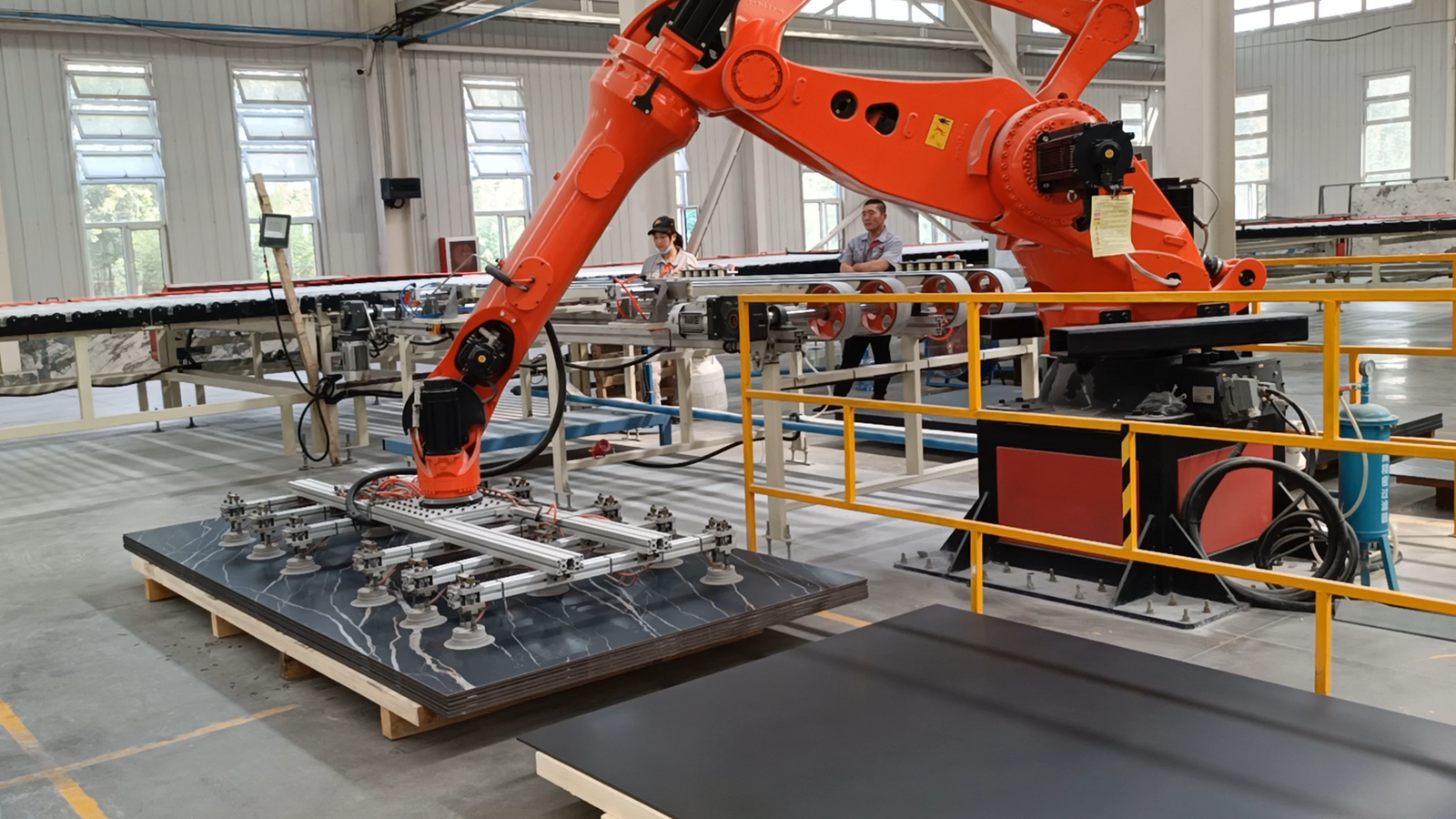 Discharging Slabs by Manipulator